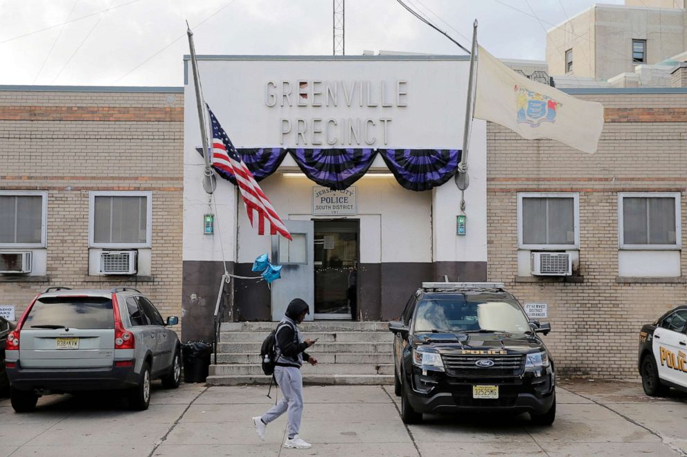 PHOTO: Bunting hangs on the Greenville precinct building in Jersey City, N.J. on Dec. 11, 2019, the day after Detective Joseph Seals was killed by two suspects in an anti-Semitic attack.