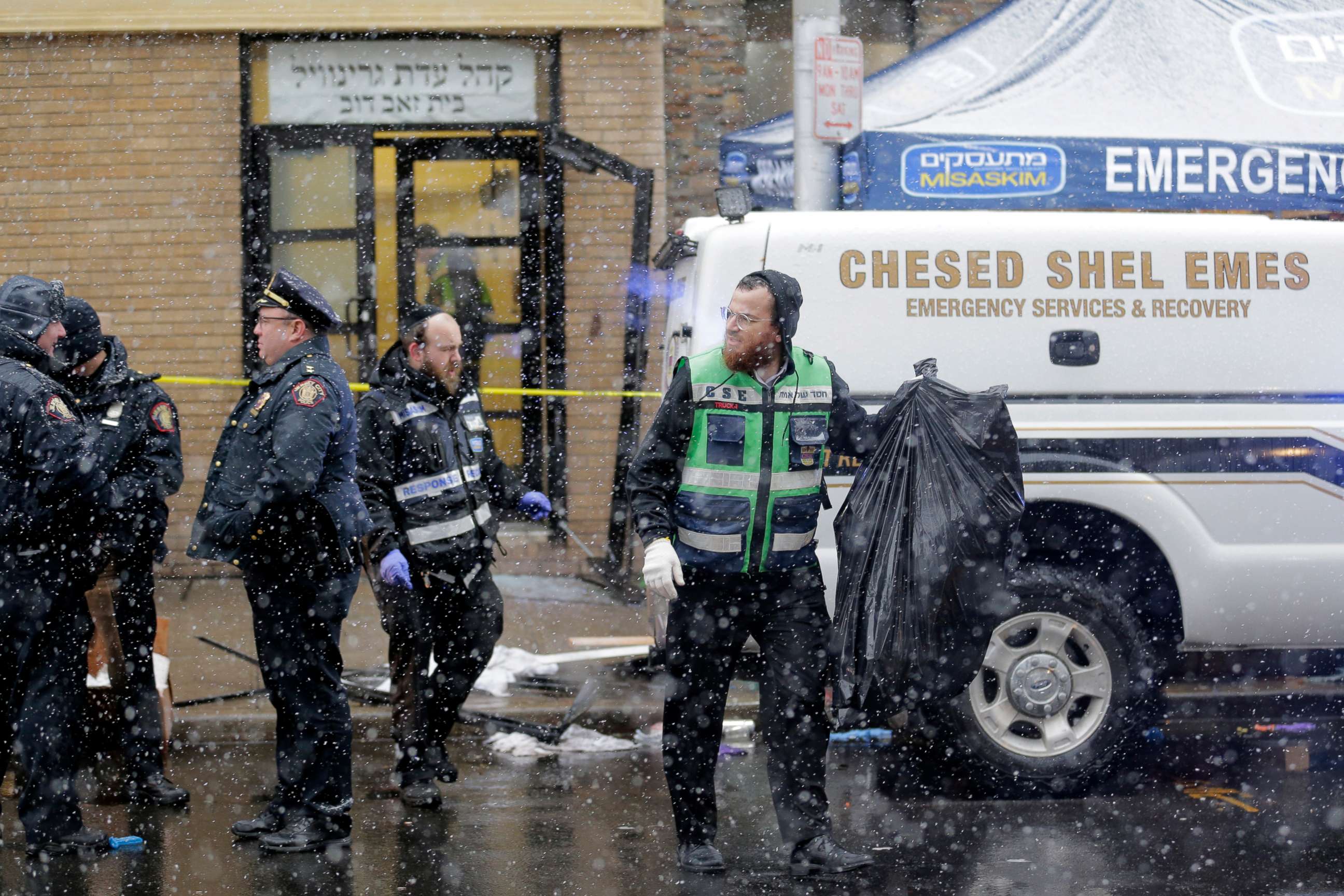 PHOTO: Emergency responders work near a kosher supermarket and a synagogue near the site of shooting in Jersey City, N.J., Dec. 11, 2019.