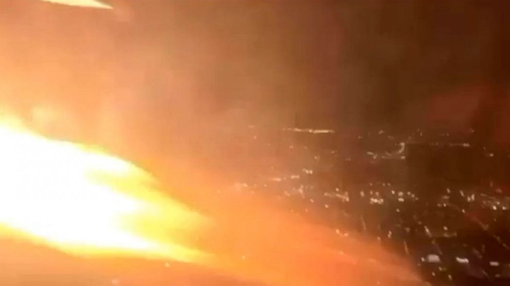 PHOTO: A still image from a video shot by a United Airlines passenger appears to show flames leaping from the engine of a plane bound for Los Angeles, Jan. 15, 2020.