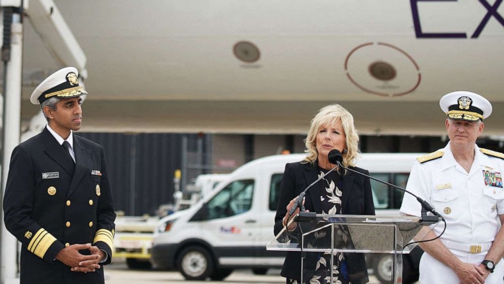 PHOTO: First Lady Jill Biden, joined by Surgeon General Vivek Murthy, delivers remarks after a shipment of infant formula, sent in through Operation Fly Formula, arrived at Dulles International Airport in Dulles, Va., May 25, 2022. 