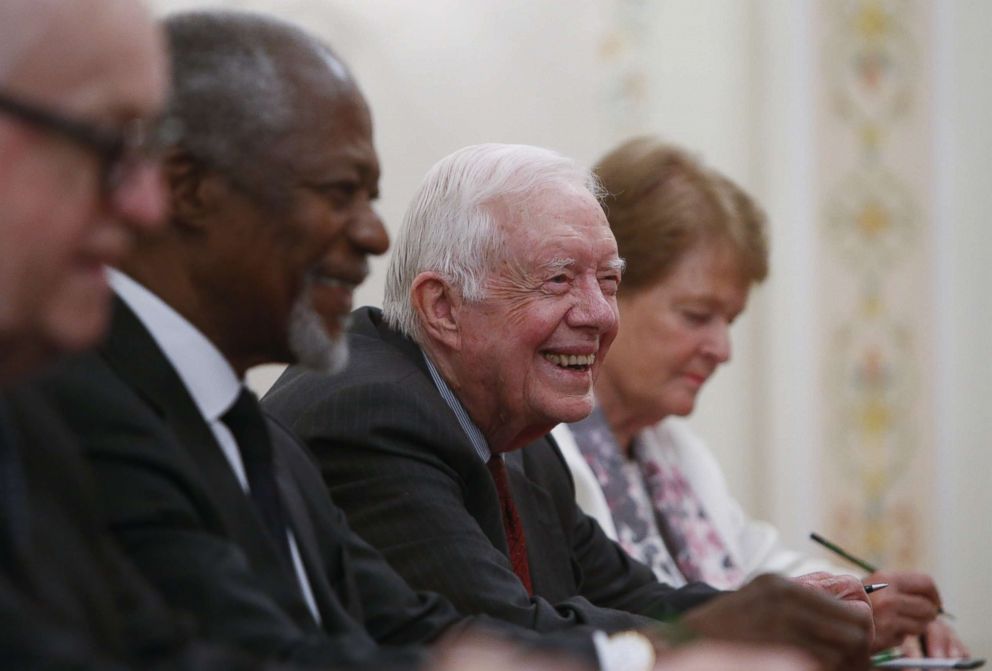 PHOTO: Former President Jimmy Carter, Kofi Annan, Gro Harlem Brundtland and other members of the Elders group attend a meeting with Russian President Vladimir Putin at the Novo-Ogaryovo residence, outside Moscow, on April 29, 2015.