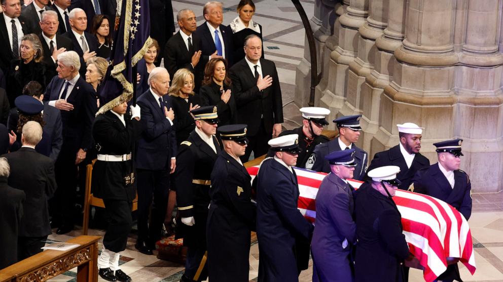 PHOTO: U.S. Military Body Bearers carry the flag-draped casket bearing the remains of former U.S. President Jimmy Carter into the Washington National Cathedral for his state funeral, Jan. 9, 2025, in Washington