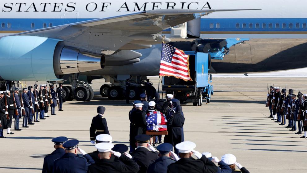 PHOTO: The flag-draped casket of former U.S. President Jimmy Carter is carried to Special Air Mission 39, during a departure ceremony at Joint Base Andrews in Maryland, Jan. 9, 2025. 