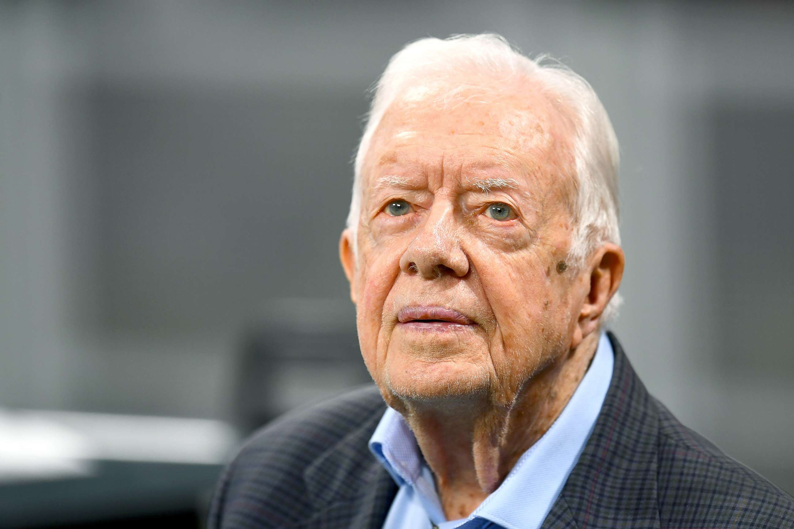 PHOTO: Former president Jimmy Carter prior to the game between the Atlanta Falcons and the Cincinnati Bengals, Sept. 30, 2018.