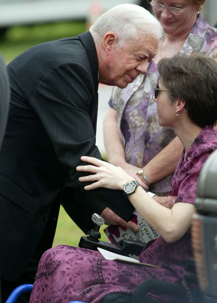 PHOTO: Former President Jimmy Carter comforts a bereaved Jeni Stepanek, mother of the late poet Mattie J.T. Stepanek, before his funeral at the St. Catherine Labour Catholic Church on June 8, 2004 in Wheaton, Md.