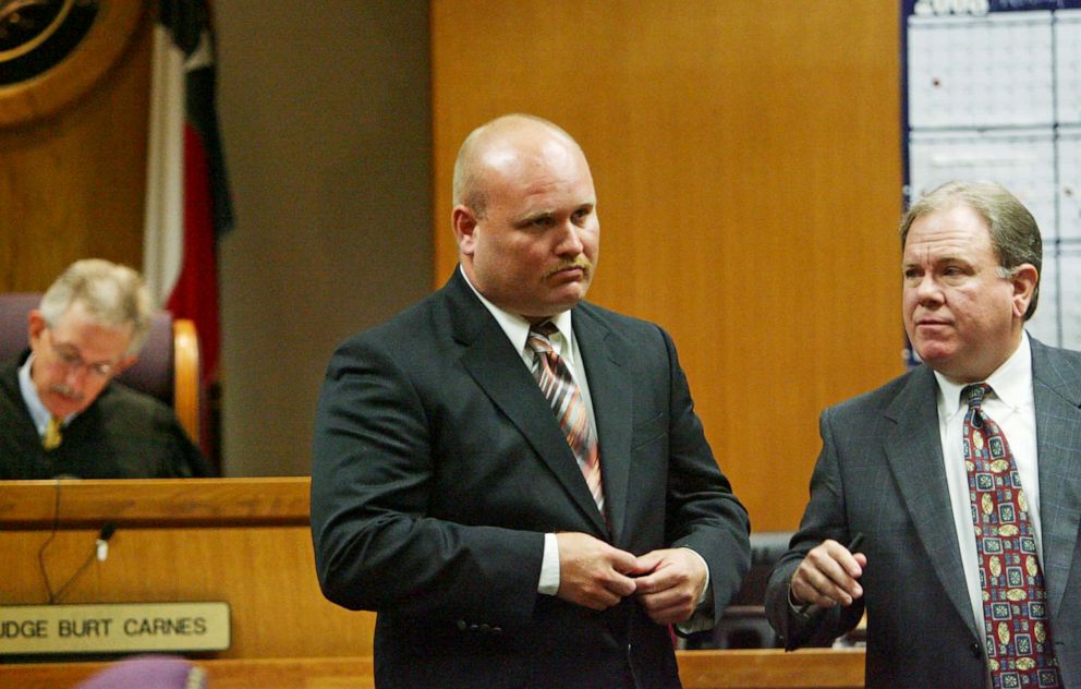 PHOTO: Jimmy Fennell Jr, left, walks away with his lawyer Bob Phillips, after Judge Burt Carnes denied Fennell's plea agreement and set a jury trial.