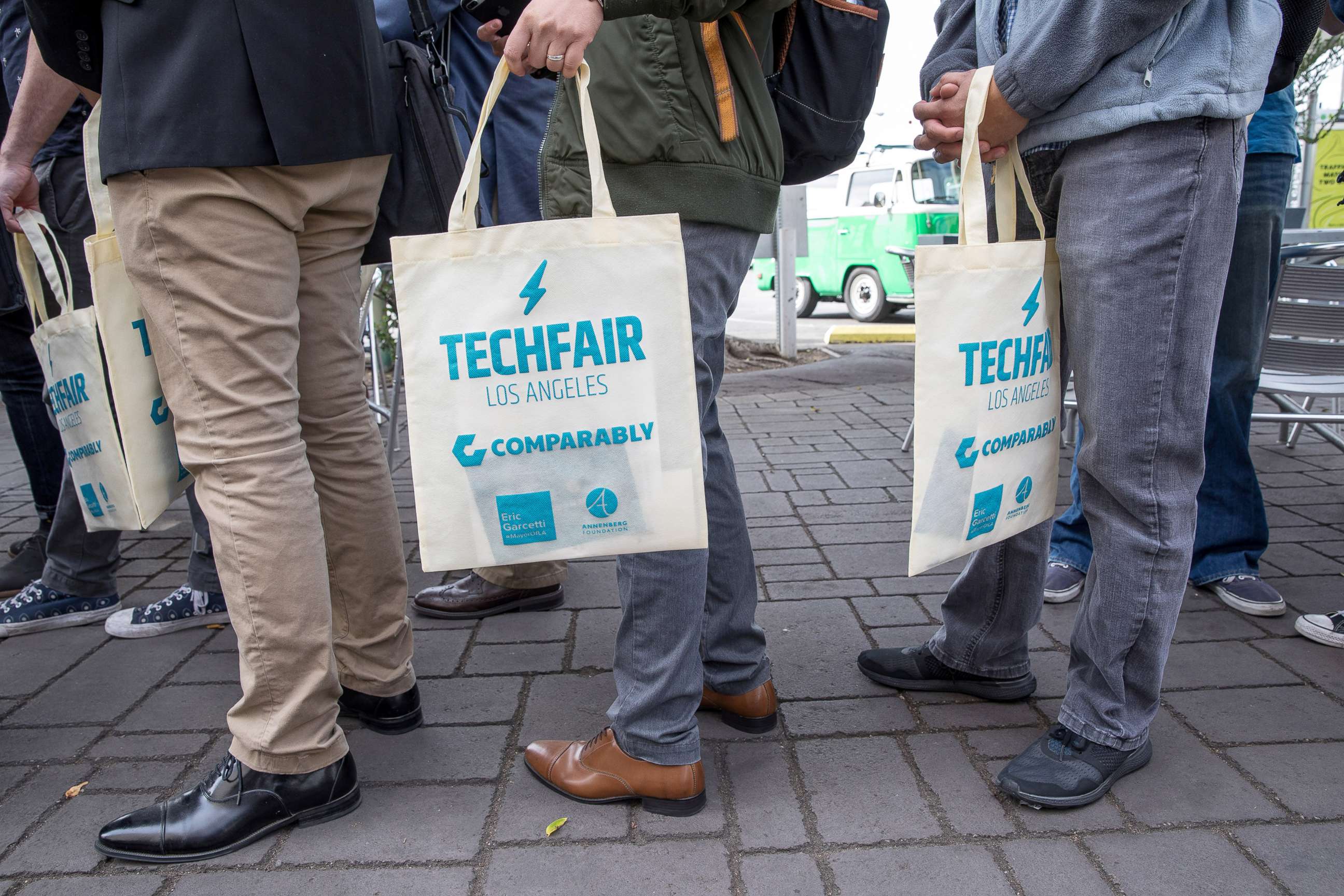 PHOTO: Job seekers line up at TechFair in Los Angeles, March 8, 2018.
