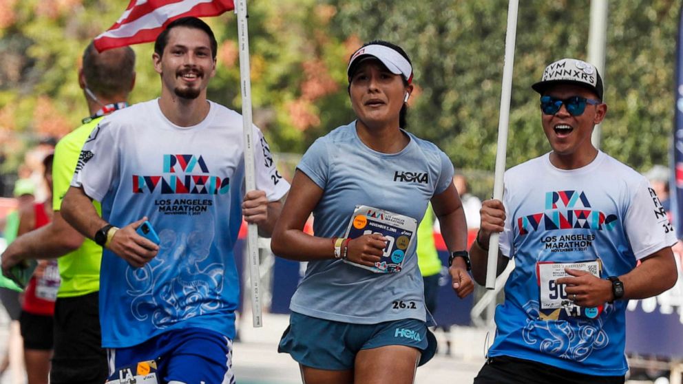 PHOTO: Jocelyn Rivas runs the last stretch of the Los Angeles Marathon, Nov. 7, 2021.