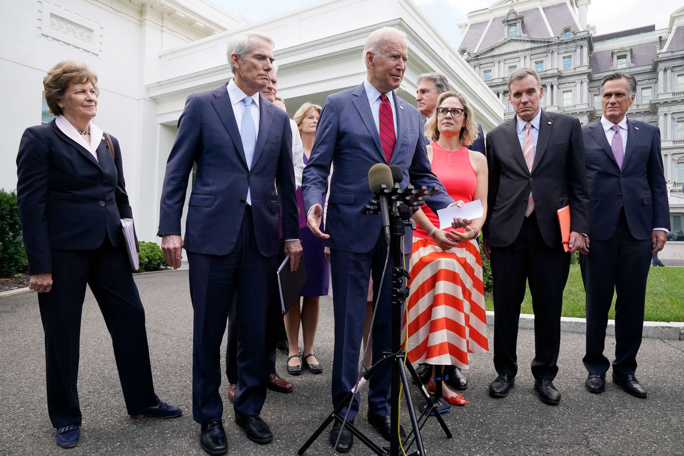 PHOTO: President Joe Biden, with a bipartisan group of senators, speaks outside the White House in Washington, June 24, 2021.