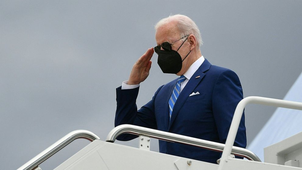 PHOTO: President Joe Biden salutes as he makes his way to board Air Force One before departing from Andrews Air Force Base in Maryland, April 12, 2022.
