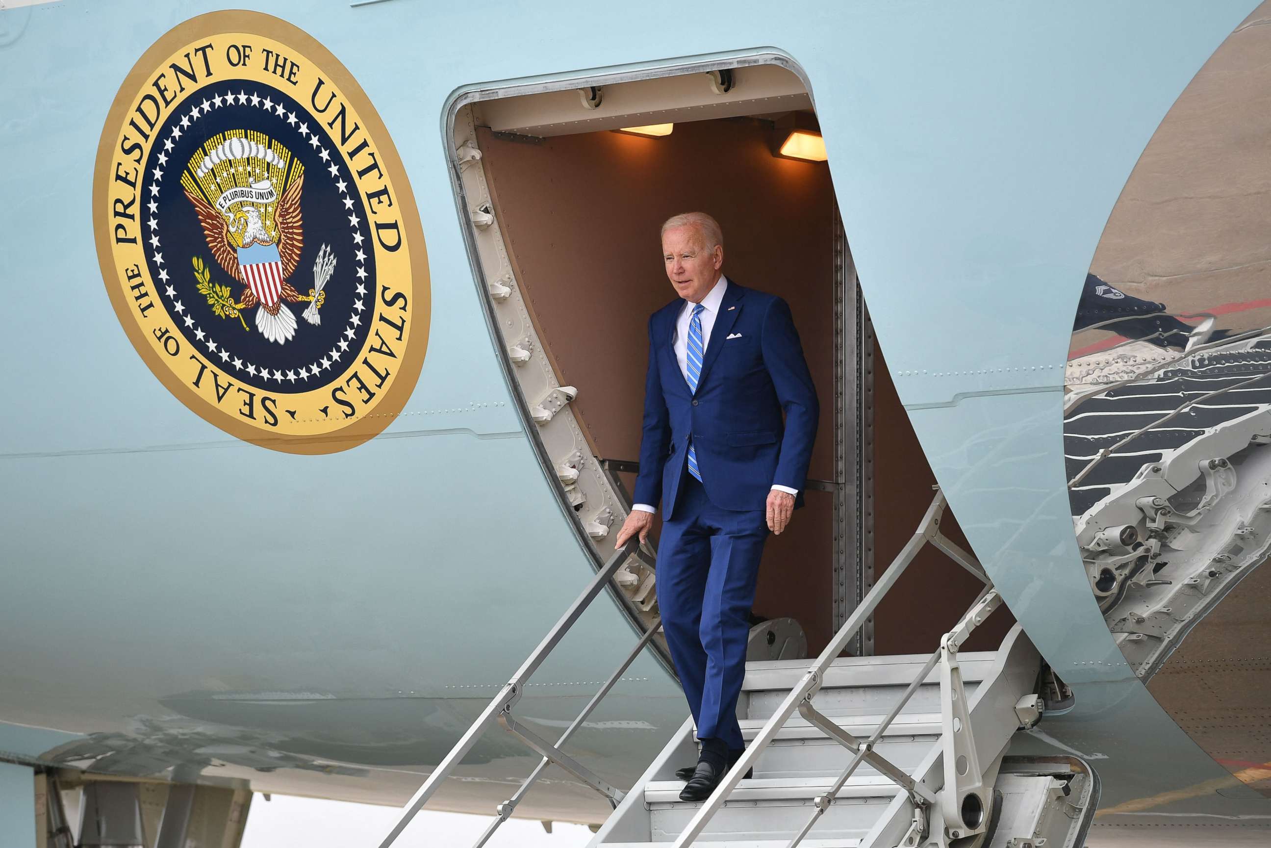 PHOTO: President Joe Biden steps off Air Force One upon arrival at Des Moines International Airport in Des Moines, Iowa, April 12, 2022.