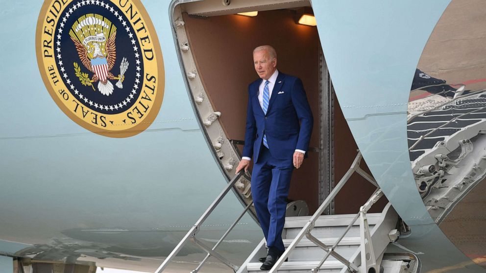 PHOTO: President Joe Biden steps off Air Force One upon arrival at Des Moines International Airport in Des Moines, Iowa, April 12, 2022.