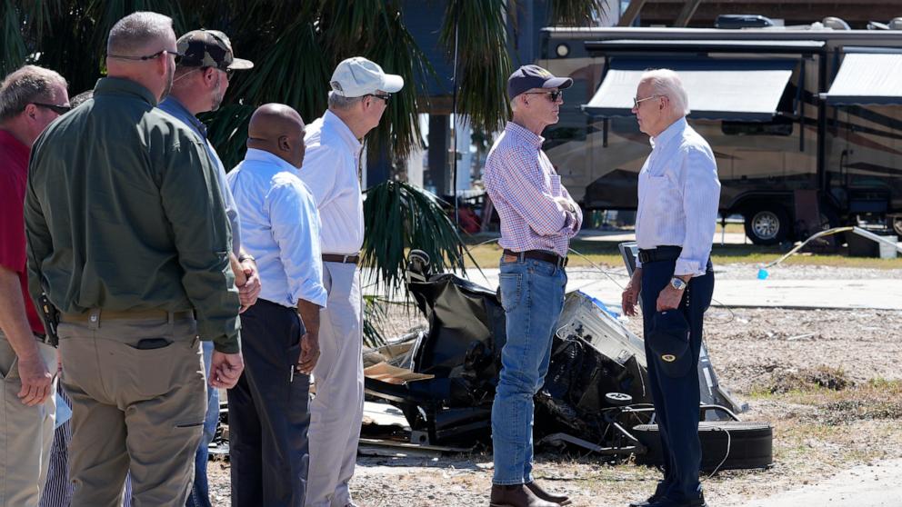 PHOTO: President Joe Biden greets Sen. Rick Scott, and other officials, in Keaton Beach, Fla., Oct. 3, 2024, during his tour of areas impacted by Hurricane Helene. 