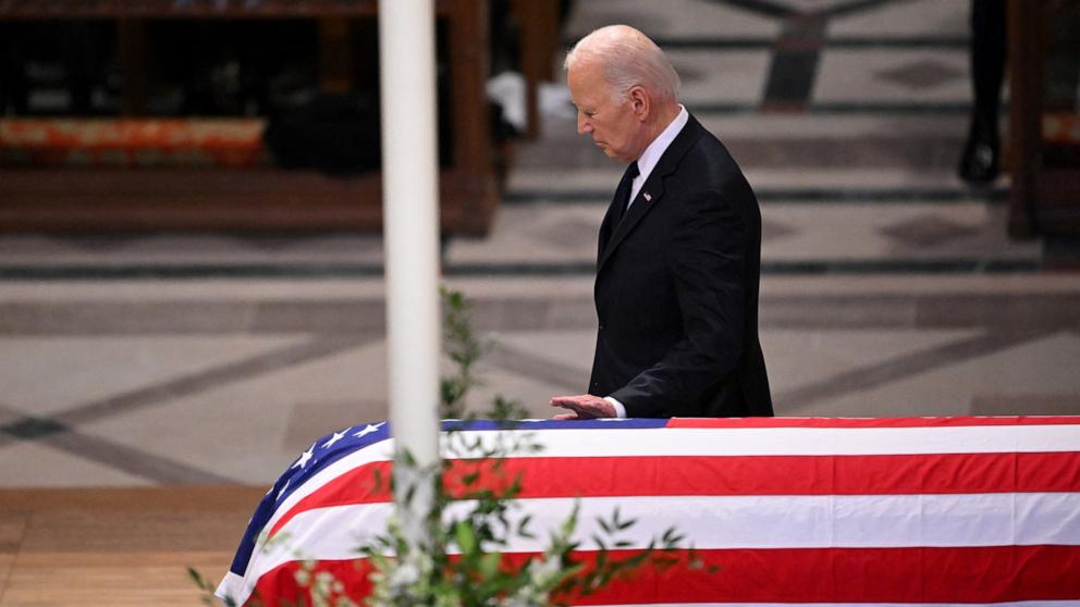 PHOTO: President Joe Biden touches the casket after delivering the eulogy at the State Funeral Service for former President Jimmy Carter at the Washington National Cathedral in Washington, Jan. 9, 2025.