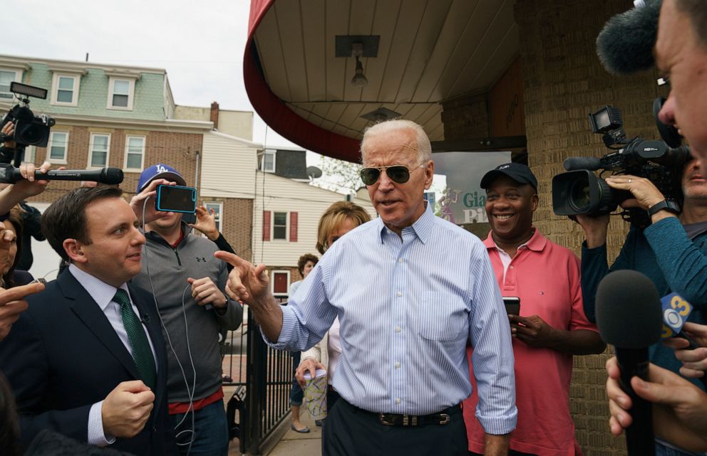 PHOTO: Democratic presidential candidate and former Vice President Joe Biden speaks outside of Gianni's Pizza, in Wilmington, Del., April 25, 2019.