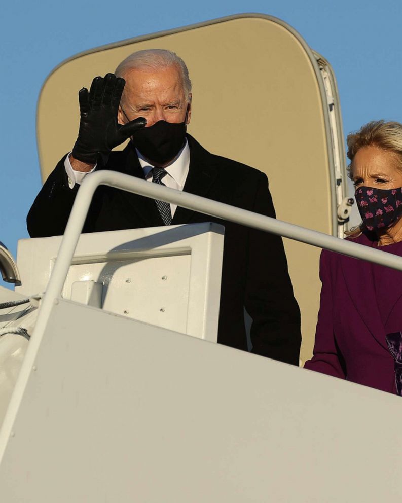 PHOTO: U.S. President-elect Joe Biden and his wife, Dr. Jill Biden, step off their airplane after arriving at Joint Base Andrews in Prince George's County, Maryland, on Jan. 19, 2021, the day before his inauguration.