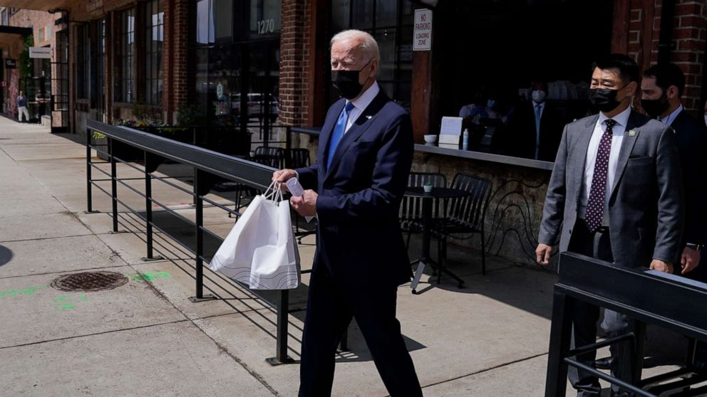 PHOTO: President Joe Biden leaves Taqueria Las Gemelas restaurant, May 5, 2021, in Washington.