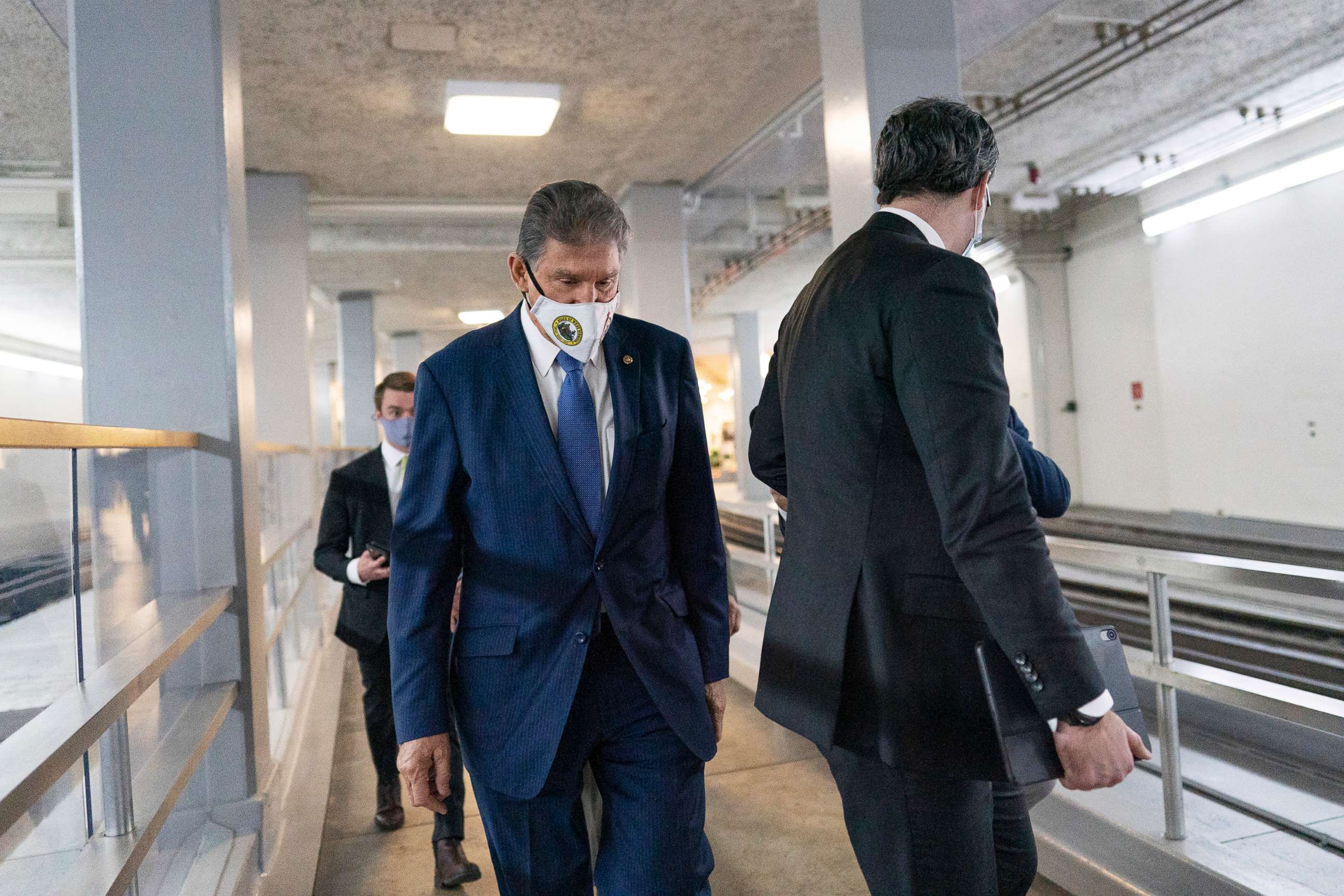 PHOTO: Sen. Joe Manchin walks through the subway on Capitol Hill in Washington, Nov. 4, 2021.