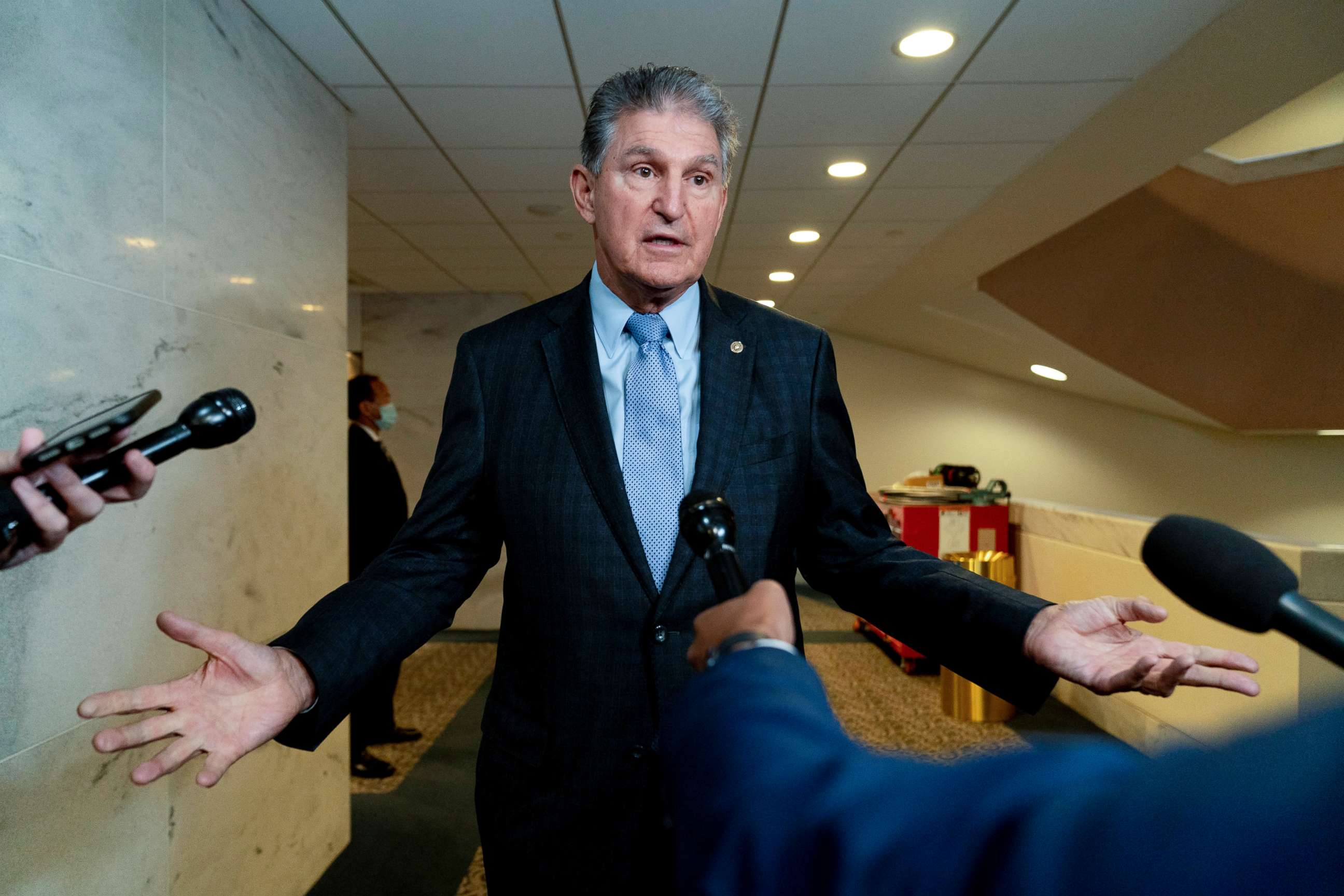 PHOTO: Sen. Joe Manchin speaks to reporters on Capitol Hill in Washington, Oct. 27, 2021. 