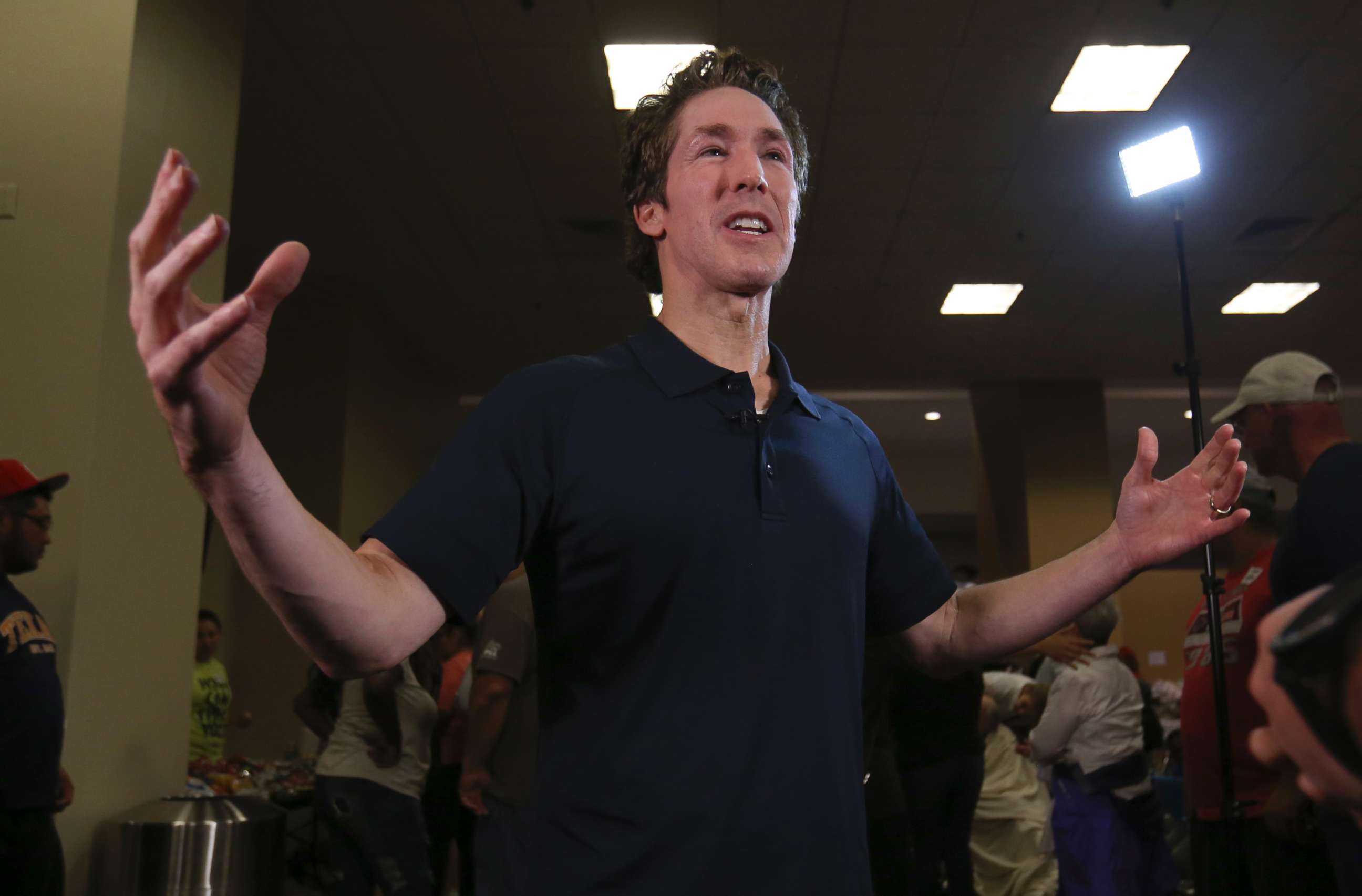 PHOTO: Pastor Joel Osteen gives an interview at his Lakewood Church in Houston, Aug. 29, 2017. Osteen and his congregation have set up their church as a shelter for evacuees from the flooding by Tropical Storm Harvey. 