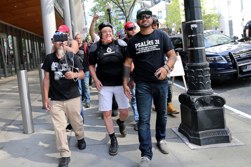 PHOTO: Joey Gibson, leader of the Patriot Prayer, leads a march through downtown Seattle, Aug. 18, 2018.
