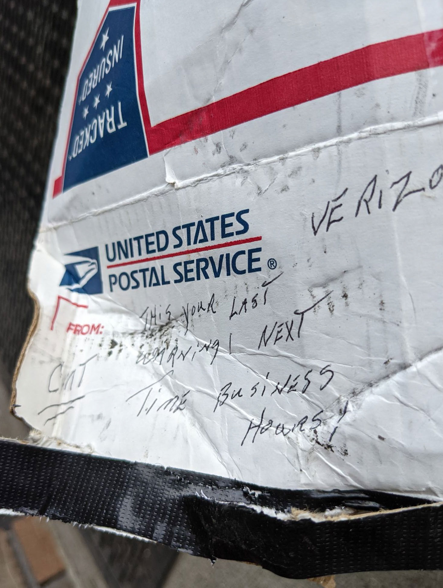 PHOTO: A image used in an FBI criminal complaint shows writing on one of the two boxes containing explosive devices left outside cell phone stores in Michigan, Sept. 15, 2021.