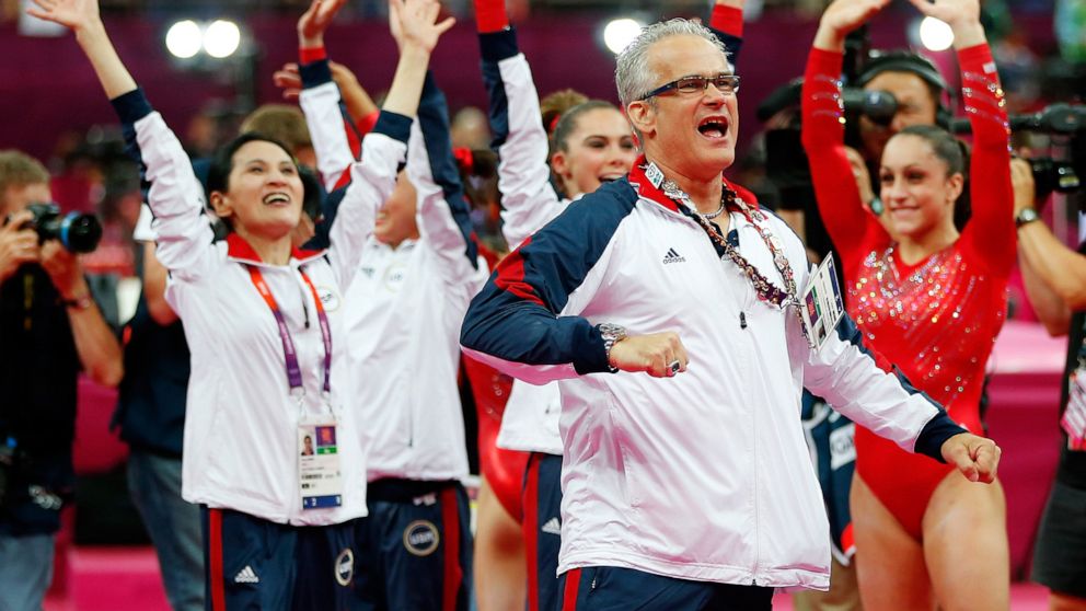 PHOTO: In this July 31, 2012, file photo, US women's gymnastics coach John Geddert celebrates during the final rotation in the Artistic Gymnastics Women's Team final on Day 4 of the London 2012 Olympic Games at North Greenwich Arena in London.