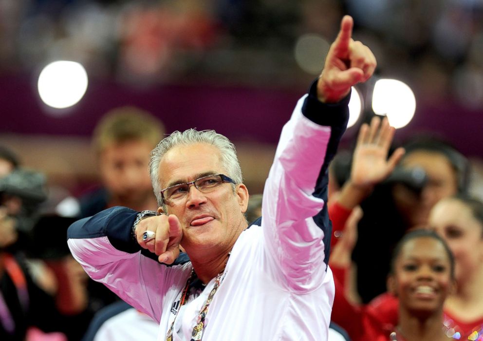 PHOTO: Women's Head Coach John Geddert celebrates as his team win the Gold Medal during the Women's Artistic Gymnastics Team Final at the 2012 London Olympic Summer Games in London, July 31, 2012.