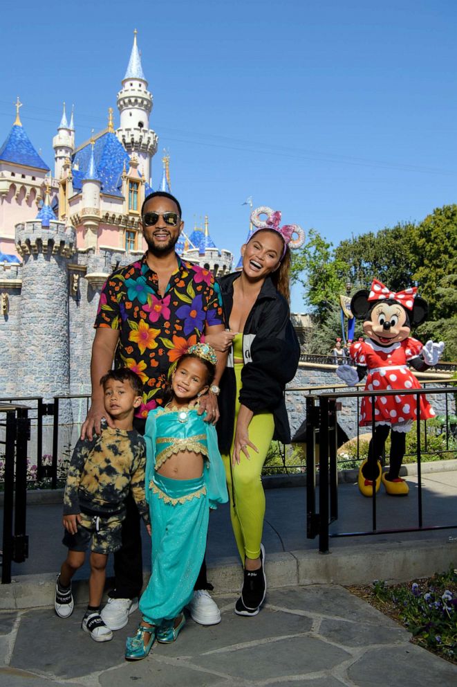 PHOTO: In this handout photo provided by Disneyland Resort, John Legend, Chrissy Teigen and their children, Miles and Luna pose with Minnie Mouse while celebrating Luna's birthday at Disneyland on April 14, 2022, in Anaheim, Calif.