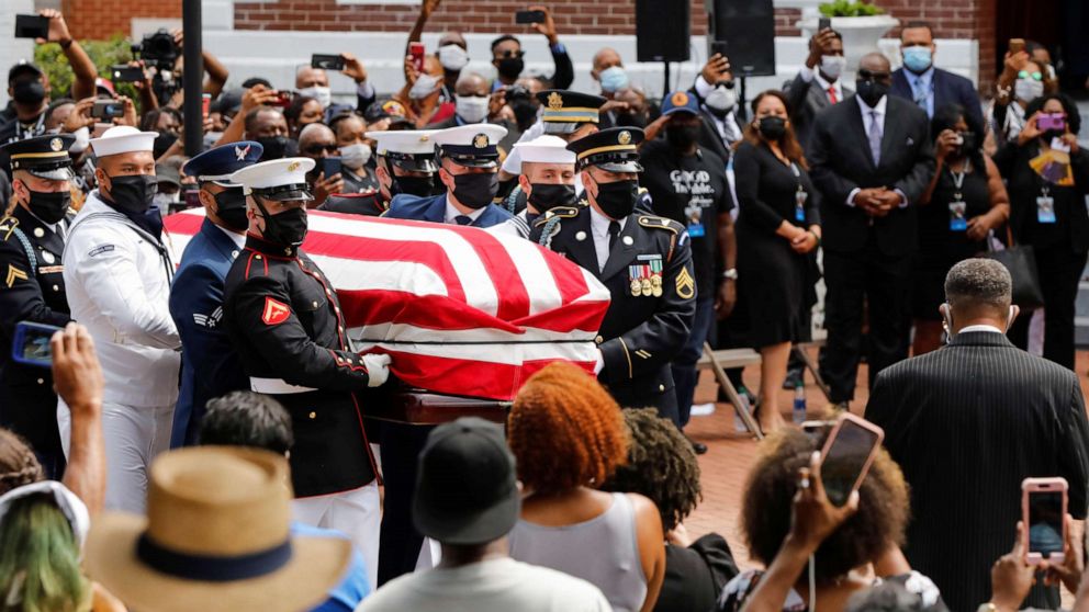 PHOTO: The casket of late congressman John Lewis, who died July 17, is carried outside the Brown Chapel A.M.E. Church in Selma, Alabama, July 26, 2020.