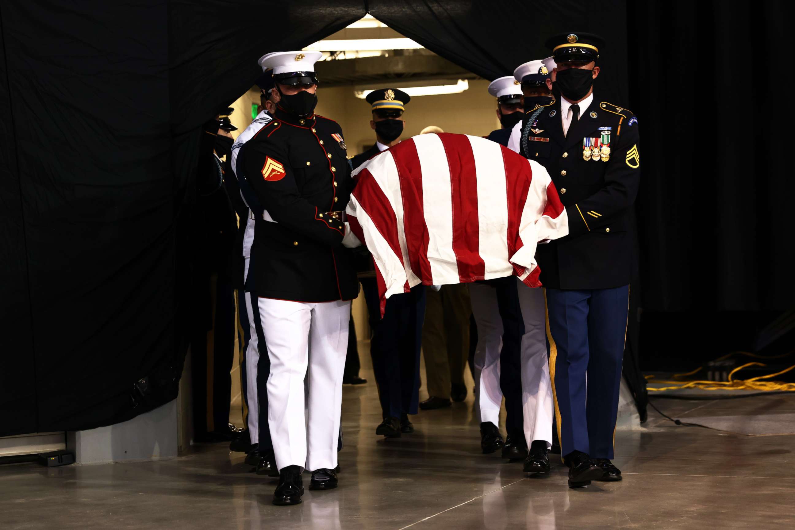 PHOTO: Pallbearers carry the casket with the body of Rep. John Lewis during The Boy from Troy service celebrating Lewis' life on July 25, 2020, in Troy, Ala.