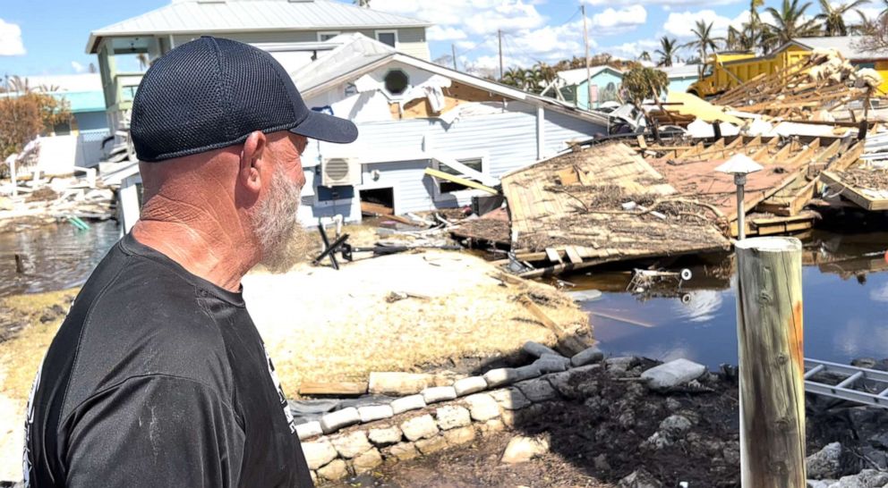PHOTO: John Lynch looks at his uncle's house that was destroyed during Hurricane Ian in Matlacha, Fla.