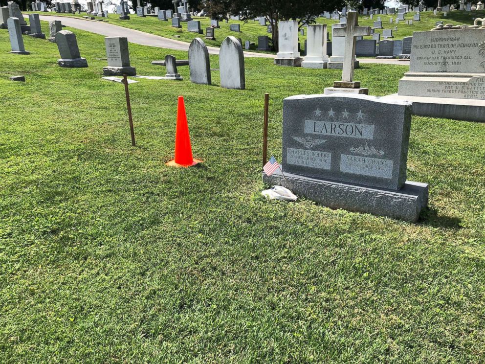 PHOTO: The burial plot of Sen. John McCain is marked with two wooden stakes and an orange cone at the U.S. Naval Academy Cemetery on Aug. 25, 2018, in Annapolis, Md.