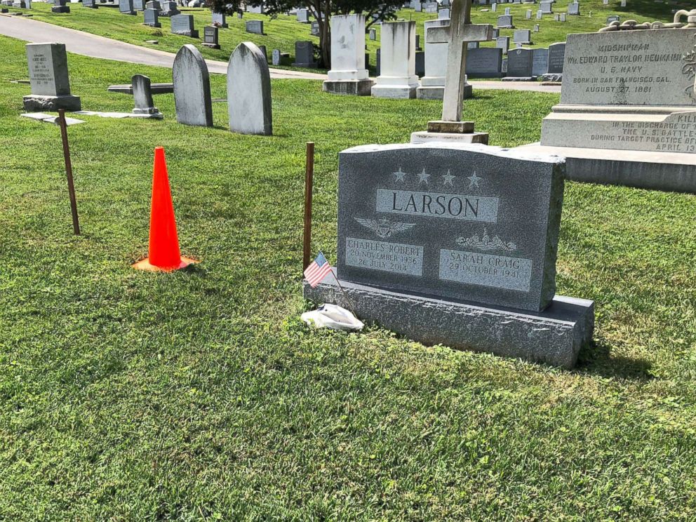 PHOTO: The burial plot of Sen. John McCain is marked with two wooden stakes and an orange cone at the U.S. Naval Academy Cemetery on Aug. 25, 2018, in Annapolis, Md.