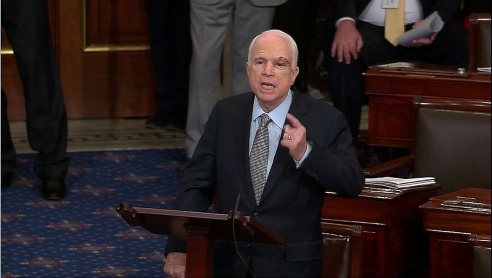 PHOTO: A still image from video shows U.S. Senator John McCain, who had been recuperating in Arizona after being diagnosed with brain cancer, acknowledging applause as he arrives on the floor of the U.S. Senate in Washington, July 25, 2017.