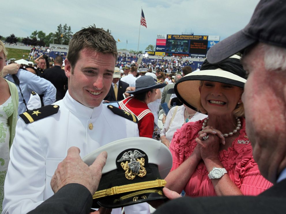 PHOTO: Jack McCain shows his cap to his parents, Sen. John McCain and Cindy McCain, at his commencement ceremony at the U.S. Naval Academy in Annapolis, Md., May 22, 2009.