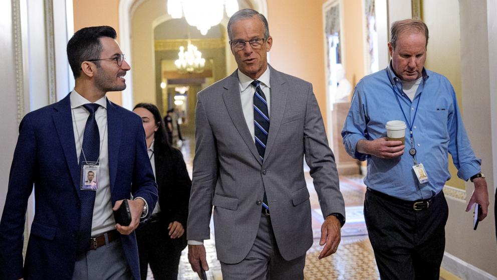 PHOTO: Senate Majority Leader John Thune speaks with reporters as he walks onto the Senate floor at the U.S. Capitol Building on Capitol Hill, October 8, 2025 in Washington.
