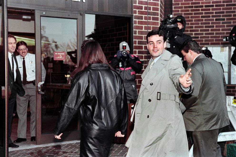 PHOTO: John Wayne Bobbitt points toward photographers as he arrives at the Prince William County Courthouse in Manassas on Jan. 18, 1994, for the fifth day of his wife Lorena's trial for malicious wounding.