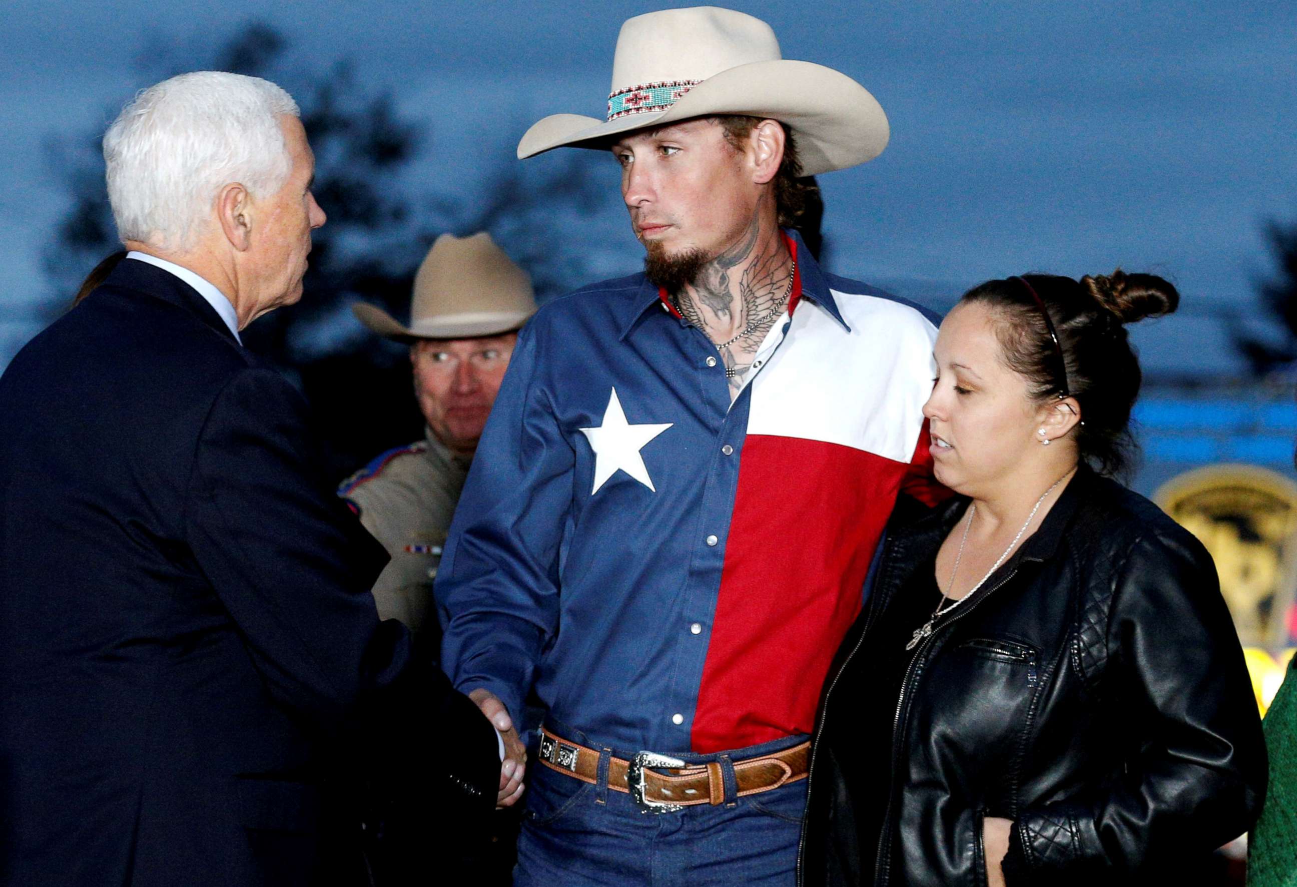 PHOTO: Vice President Mike Pence shakes hands with Johnnie Langendorff, who was one of the heroes that chased the assailant, near the site of the shooting at the First Baptist Church of Sutherland Springs in Sutherland Springs, Texas, Nov. 8, 2017.