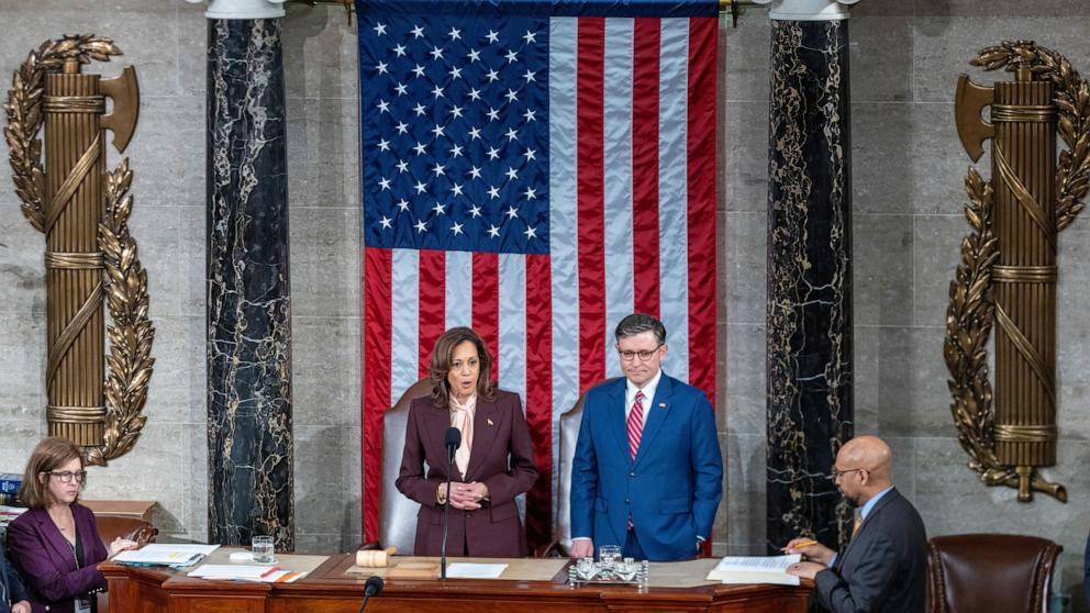 PHOTO: Vice President Kamala Harris stands next to Speaker of the House Mike Johnson in the House chamber of the Capitol as lawmakers gather to certify President-elect Trump's election victory in Washington, Jan. 6, 2025. 