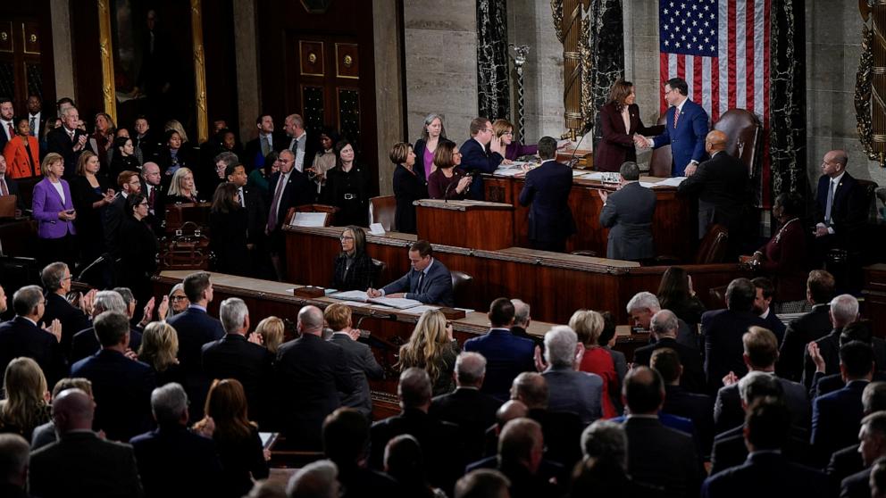 PHOTO: Vice President Kamala Harris shakes hands with Speaker of the House Mike Johnson after reading the results confirming the Electoral College votes during a joint session of Congress at the U.S. Capitol in Washington, January 6, 2025. 