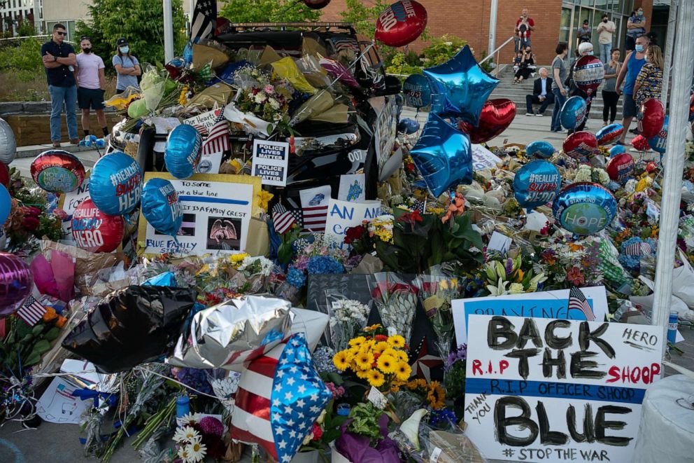 PHOTO: A memorial for slain Police Officer Jonathan Shoop is shown outside the Bothell Police Department on July 14, 2020 in Bothell, Washington.