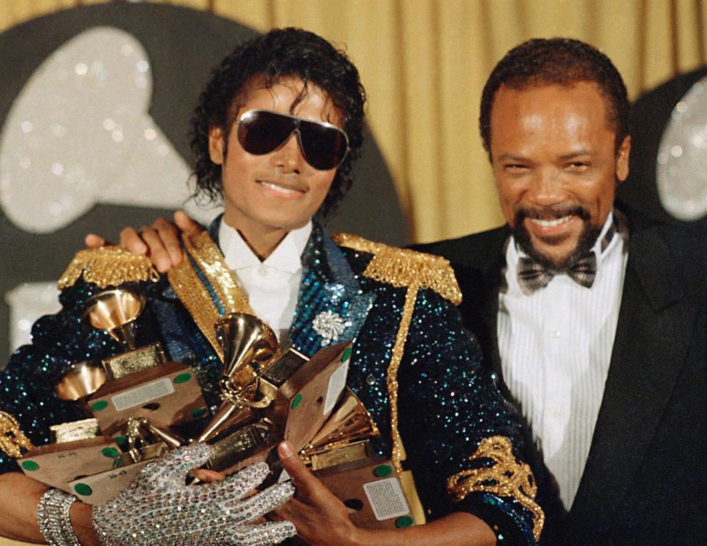 PHOTO: Michael Jackson, left, holds eight awards as he poses with Quincy Jones at the Grammy Awards in Los Angeles, Feb. 28, 1984. 