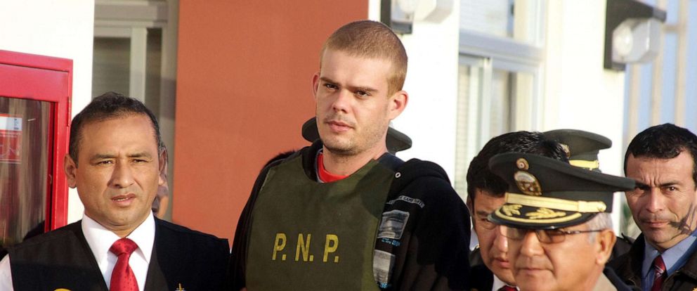 PHOTO: In this June 4, 2010, file photo, Joran van der Sloot is escorted by police after being handed over by Chilean authorities at the border between both countries in Tacna, 1,250 kilometers south of Lima, Peru.