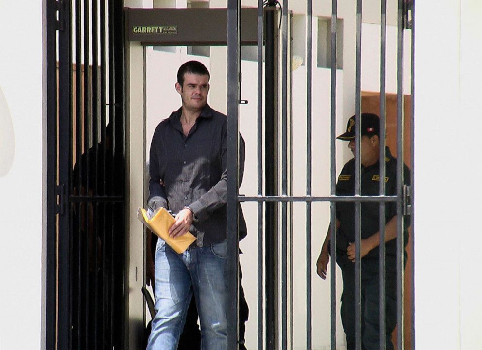 PHOTO: In this May 8, 2012, file photo, Dutch citizen Joran Van der Sloot walks handcuffed to a courtroom at the Piedras Gordas prison in Lima, Peru.