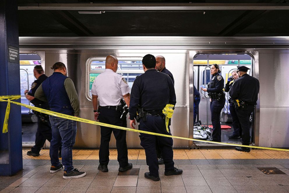 PHOTO: New York police officers respond to the scene where a fight was reported on a subway train, May 1, 2023, in New York.