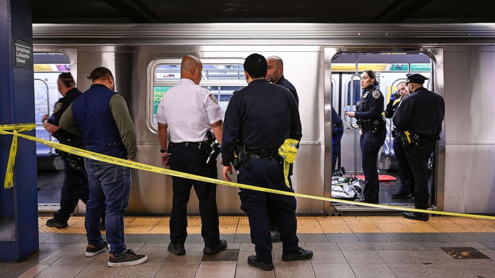 PHOTO: New York police officers respond to the scene where a fight was reported on a subway train, May 1, 2023, in New York.