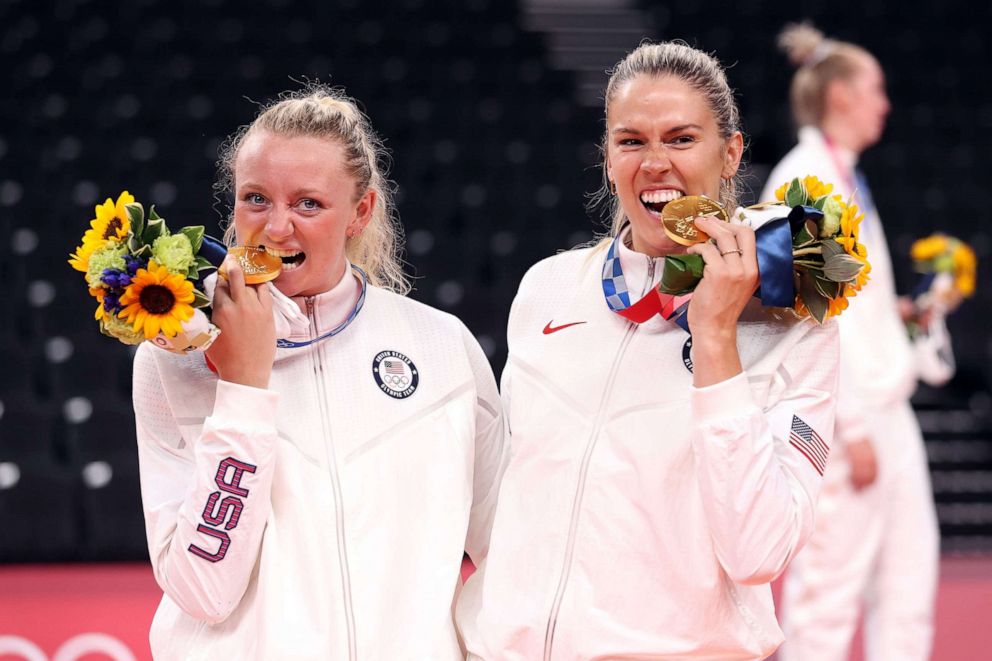 PHOTO: In this Aug 8, 2021, file photo, players of Team United States react after receiving their Gold Medals during the Victory Ceremony at the Tokyo 2020 Olympic Games at Ariake Arena in Tokyo.