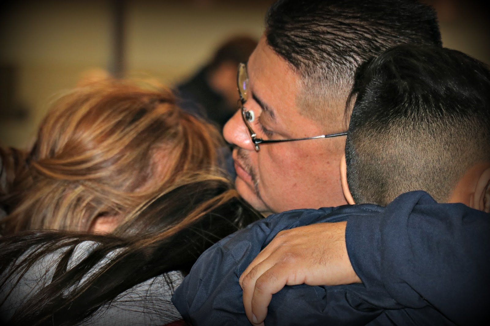 PHOTO: Jorge Garcia says goodbye to his family at Detroit Metropolitan airport before being deported, Jan. 15, 2018.
