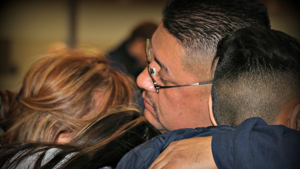PHOTO: Jorge Garcia says goodbye to his family at Detroit Metropolitan airport before being deported, Jan. 15, 2018.